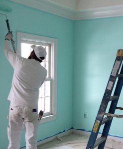 Man Painting a Wall Seafoam Teal